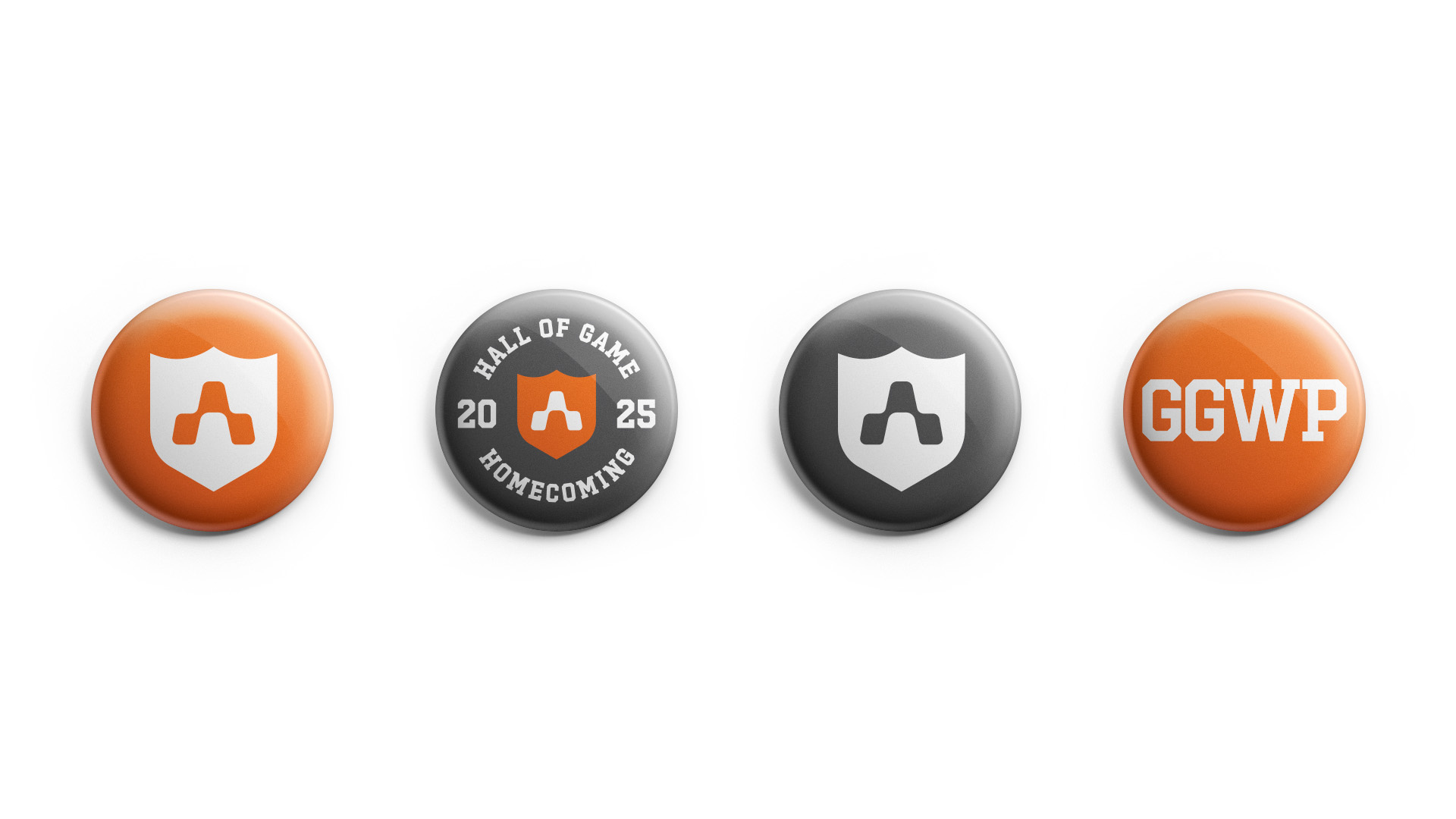 Four buttons: orange and gray A shields, a Hall of Game Homecoming 2025 roundel, and GGWP
