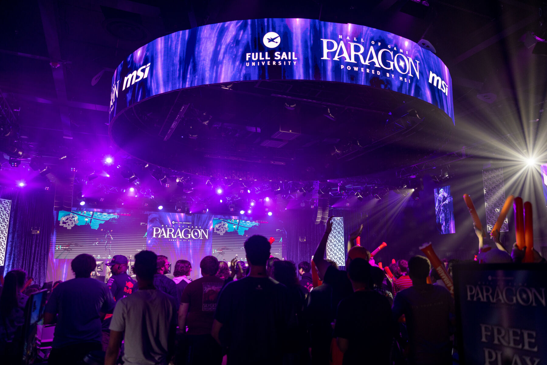 The Paragon ring and stage screens above a packed crowd