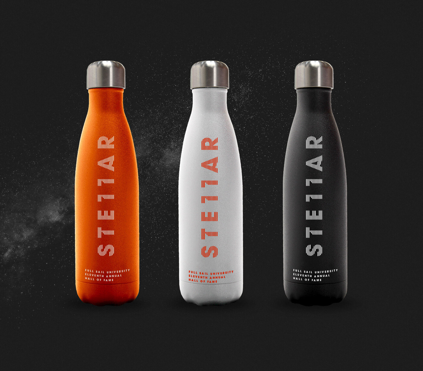Stellar water bottles in orange, white and black