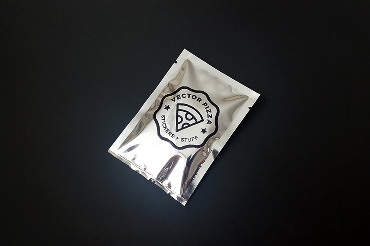 A single silver mylar bag hand-stamped with the Vector Pizza seal